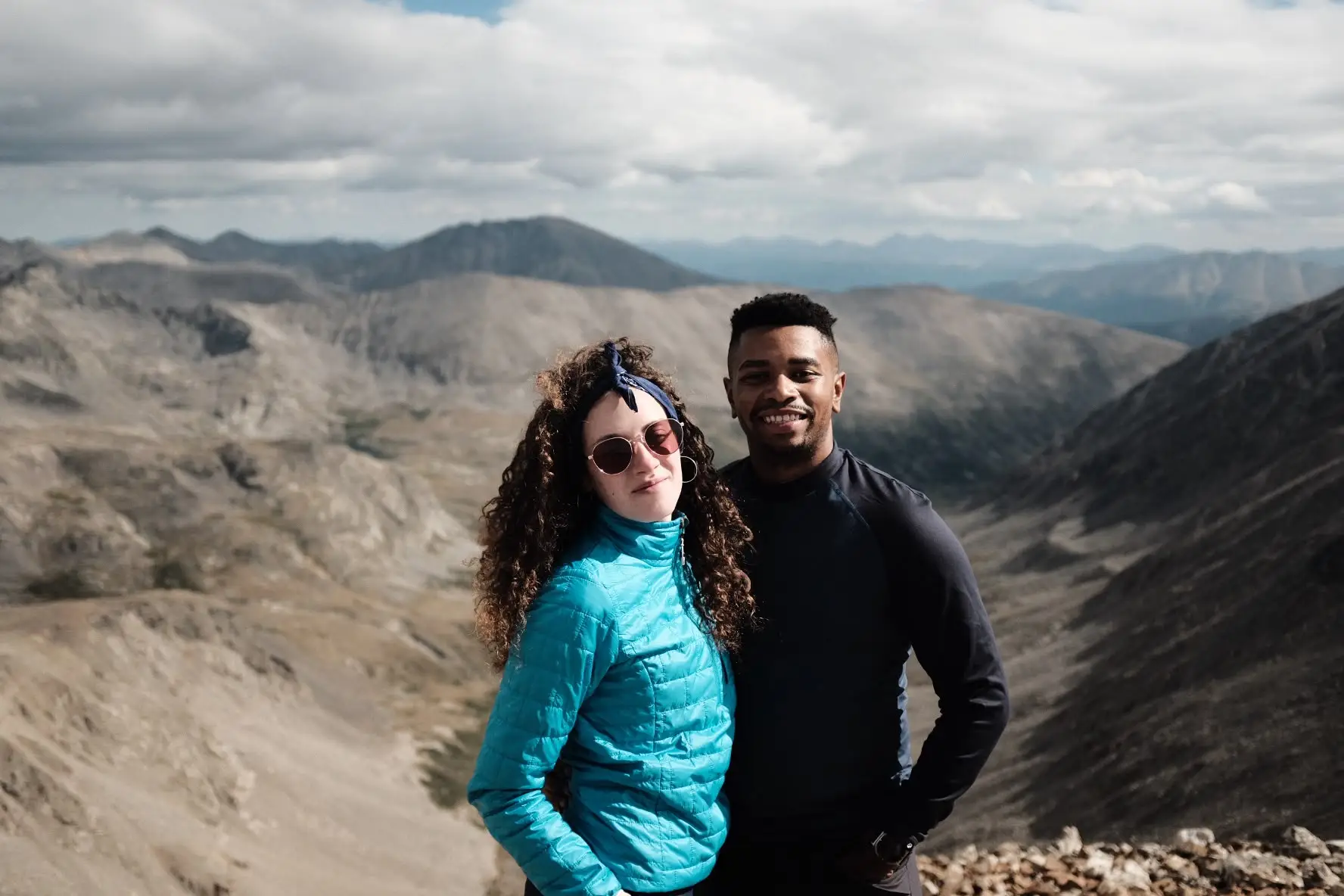 Dóra and Leon together on a rocky mountain summit